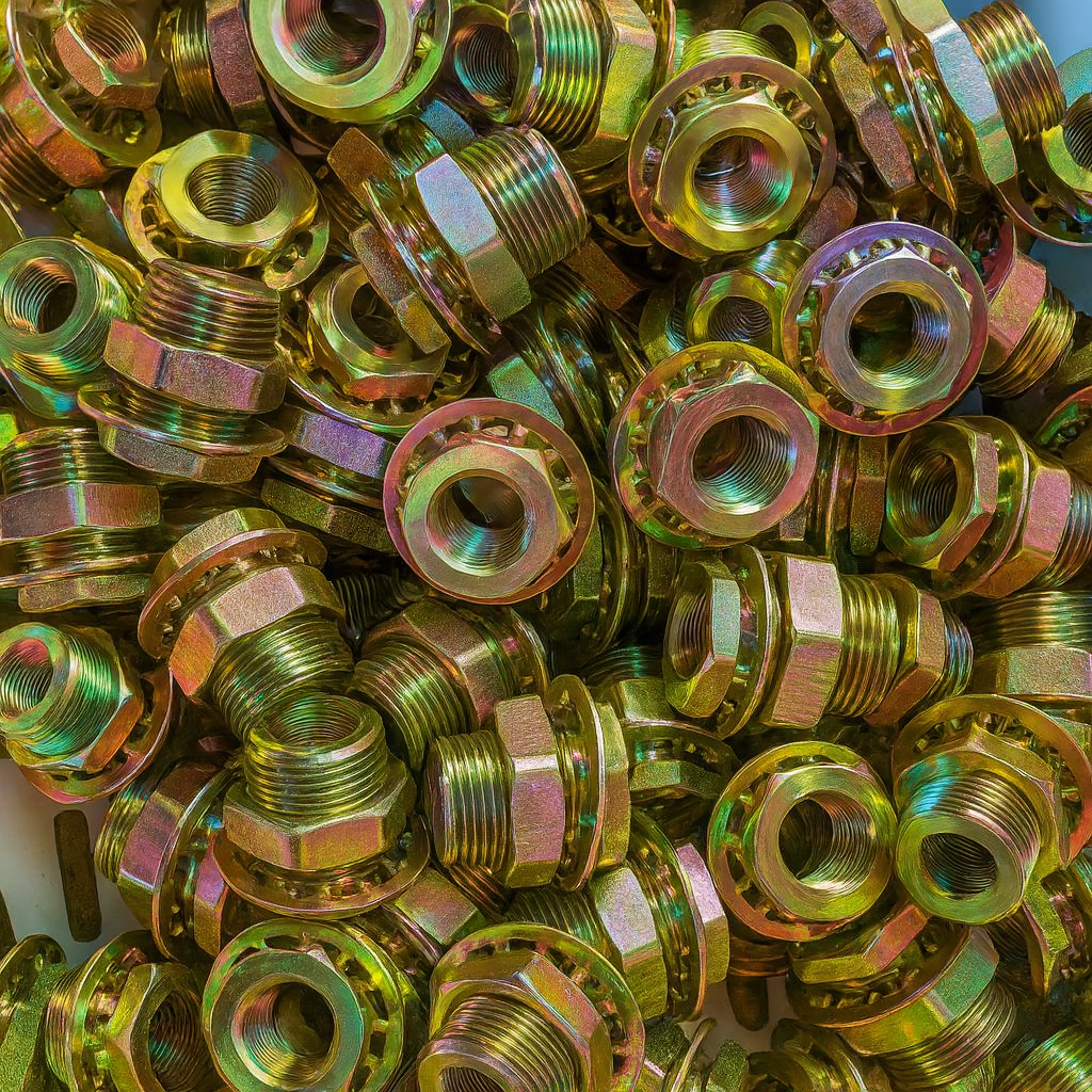 CNC lathe machines operating on custom metal pipe fittings at Hongqian factory floor